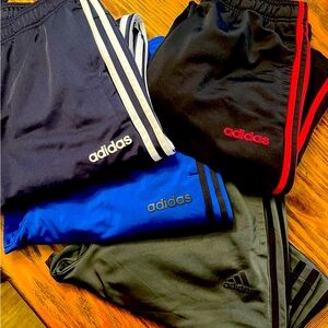 Adidas Pants Navy/white - med
Black/red- med Blue/black- lg
Grey/black- lg